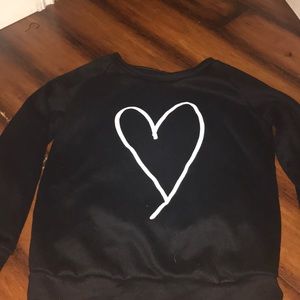Black sweater with white heart